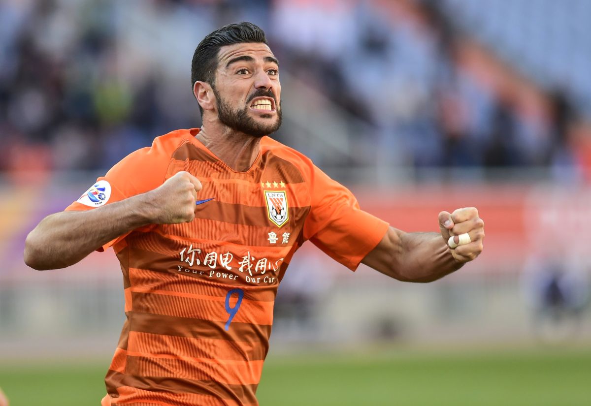 Graziano Pelle of Shandong Luneng celebrates after scored during the AFC Champions League group stage football match between China's Shandong Luneng and Japan's Kashima Antlers in Jinan in China's eastern Shandong province on March 12, 2019. (Photo by STR