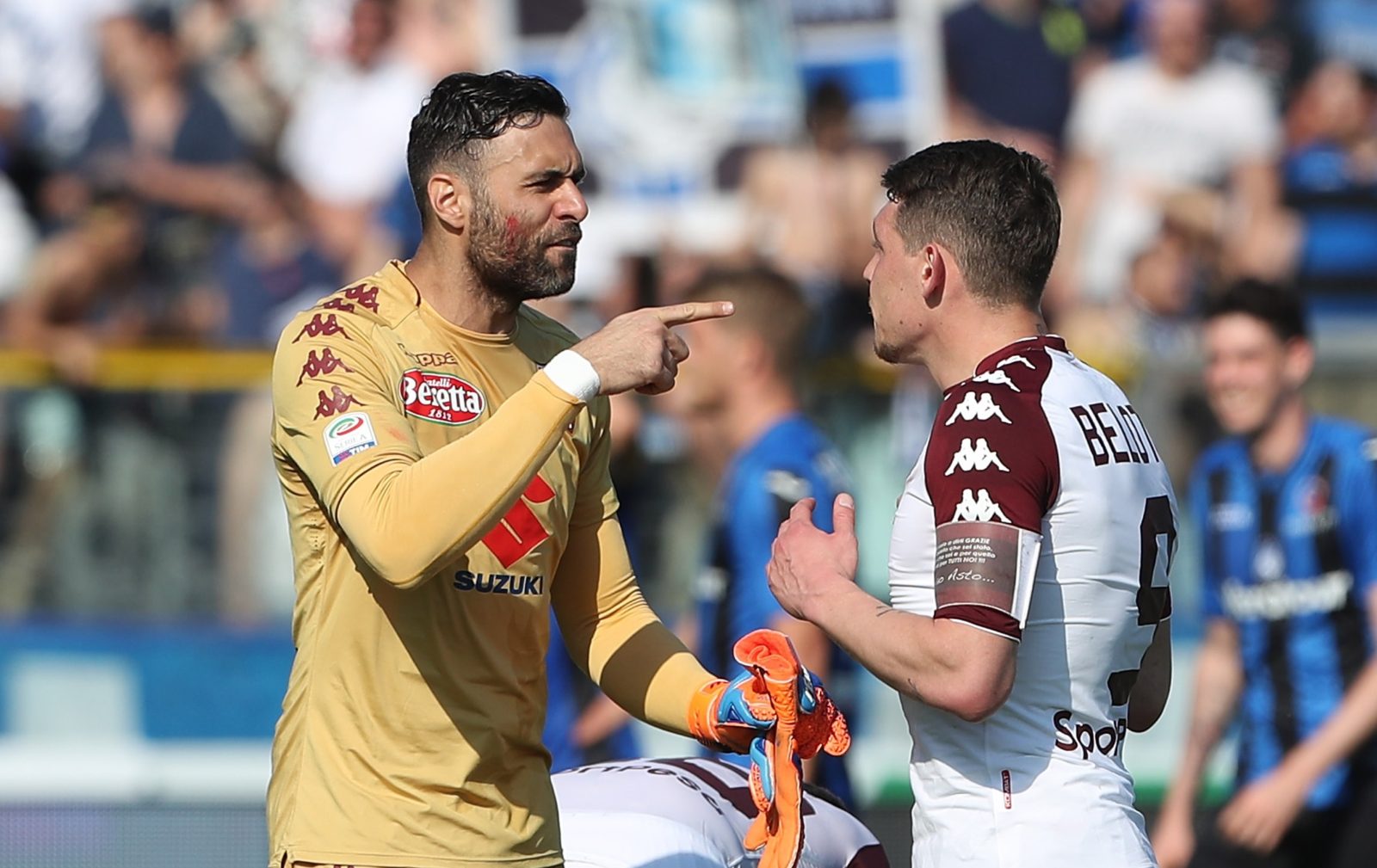 BERGAMO, ITALY - APRIL 22: Salvatore Sirigu of Torino FC disputes with his team mate Andrea Belotti at the end of the serie A match between Atalanta BC and Torino FC at Stadio Atleti Azzurri d'Italia on April 22, 2018 in Bergamo, Italy. (Photo by Marco Lu