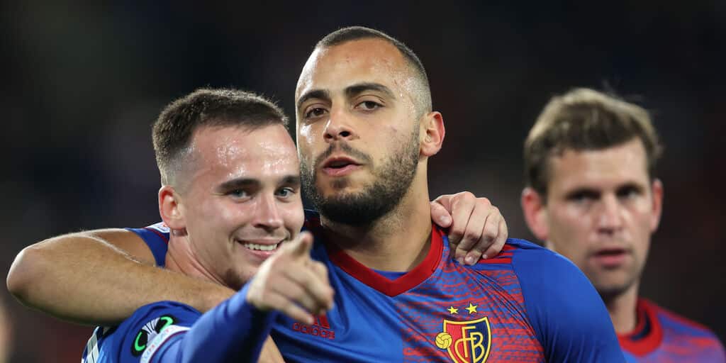 BASEL, SWITZERLAND - SEPTEMBER 30: Arthur Cabral of FC Basel celebrates with team mate Liam Millar after scoring their sides first goal during the UEFA Europa Conference League group H match between FC Basel and FK Kairat at St Jakob-Park on September 30,