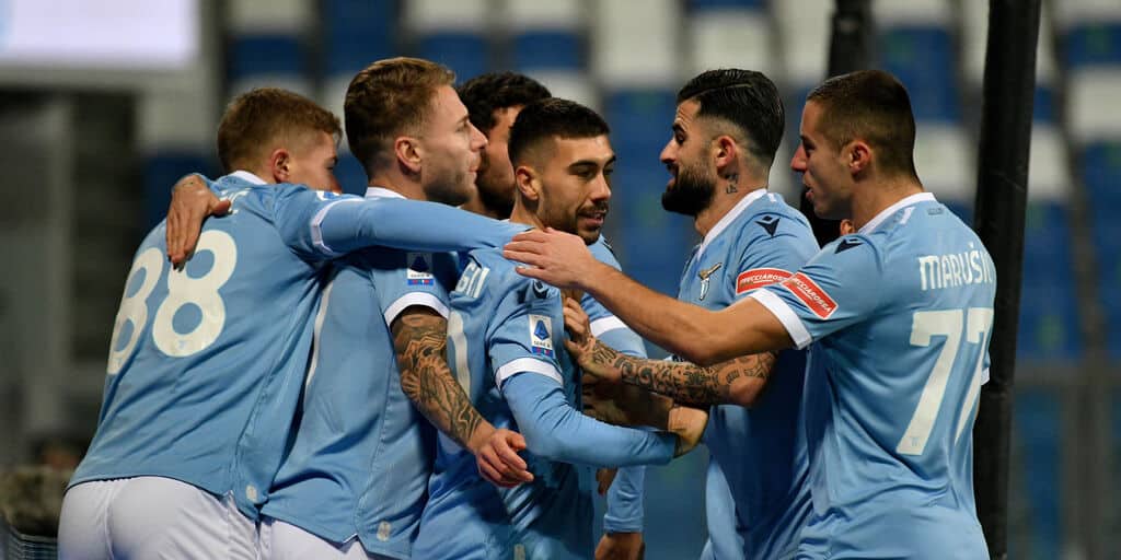 REGGIO NELL'EMILIA, ITALY - DECEMBER 12: Mattia Zaccagni of SS Lazio of SS Lazio celebrates after scoring the opening goal of his team with his teammatesduring the Serie A match between US Sassuolo and SS Lazio at Mapei Stadium - Citta' del Tricolore on D