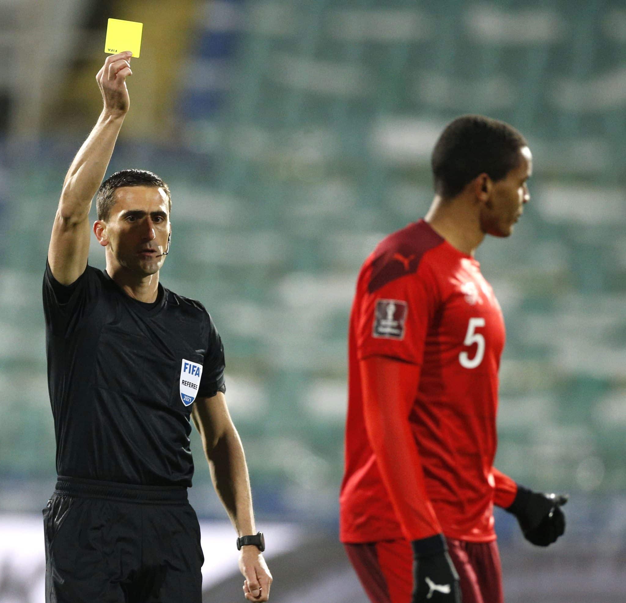 SOFIA, BULGARIA - MARCH 25: Referee Nikola Dabanovic and Manuel Akandji of Switzerland during the FIFA World Cup 2022 Qatar qualifying match between Bulgaria and Switzerland at Vasil Levski National Stadium on March 25, 2021 in Sofia, Bulgaria. (Photo by 