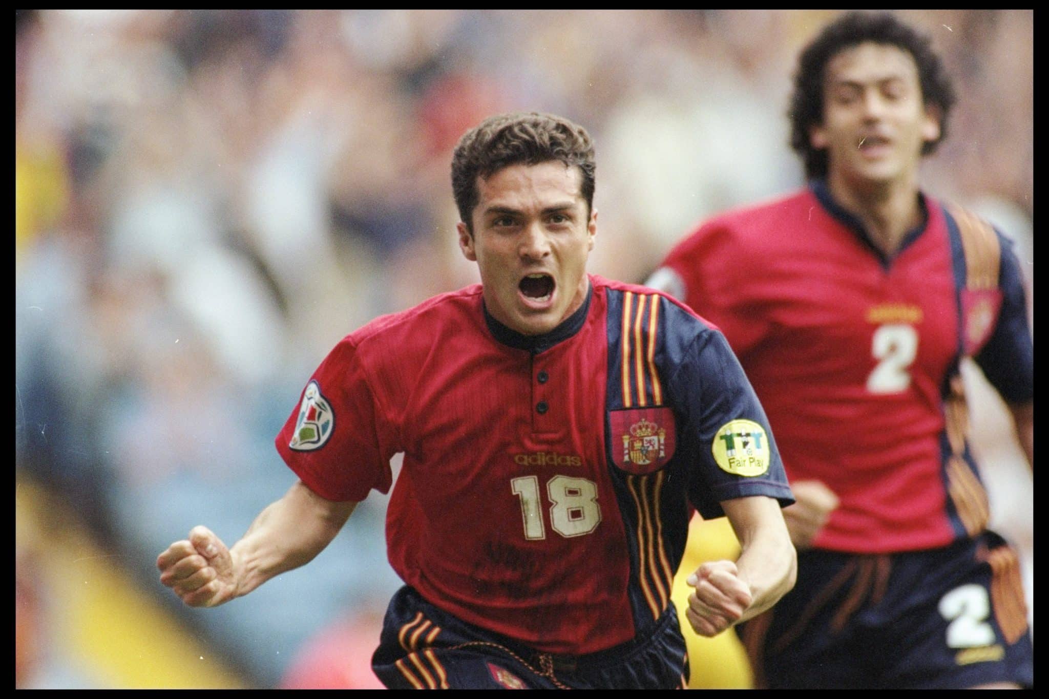 18 Jun 1996: Guillermo Amor of Spain celebrates his goal against Romania in the Group B match in the European Football Championships played at Elland Road. Spain beat Romania 2-1.